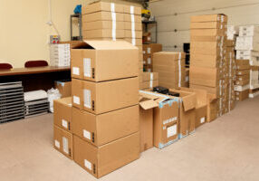 Small,Warehouse,With,Cardboard,Boxes